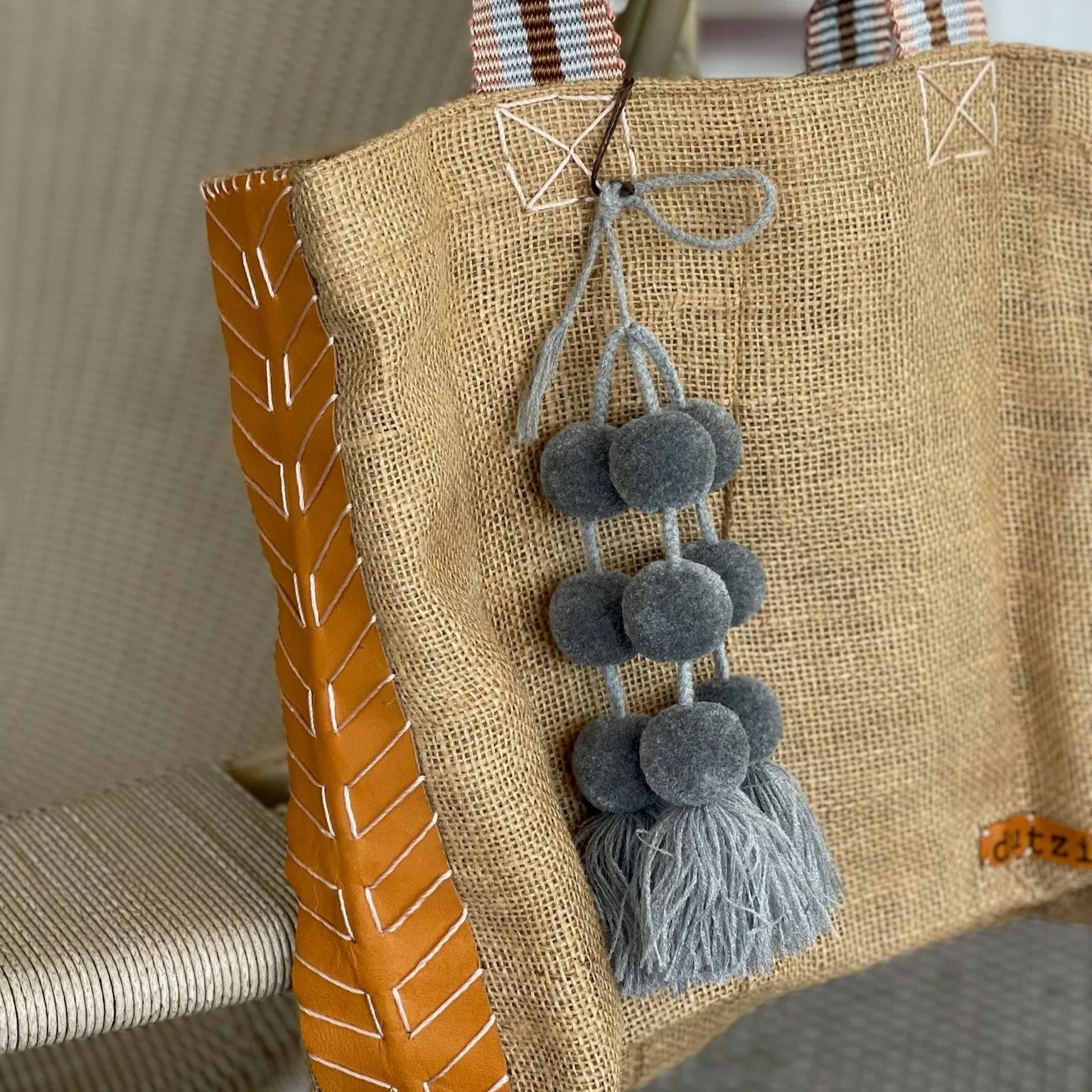 Dutzi Vintage Burlap Tote with pompom