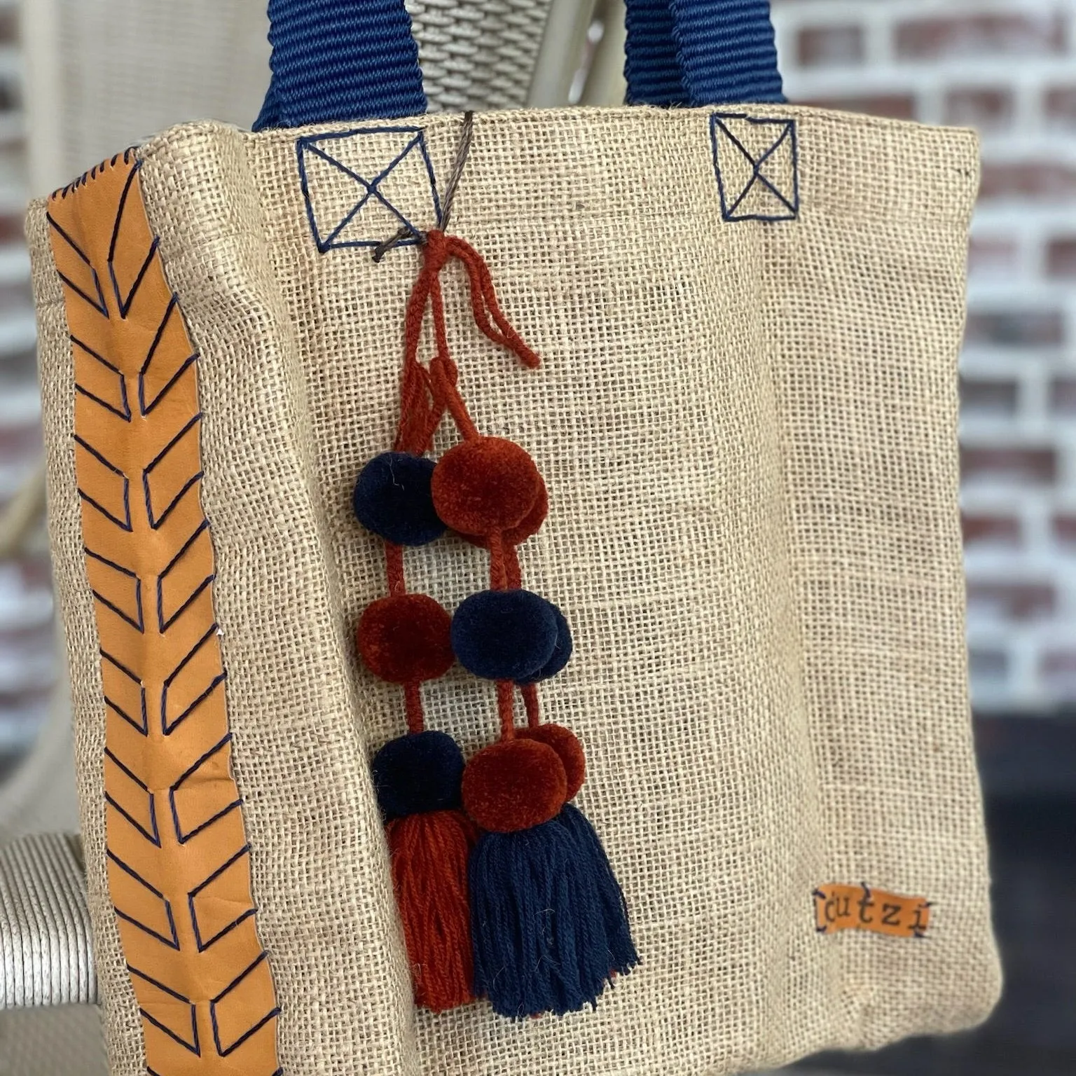 Dutzi Vintage Burlap Tote with pompom