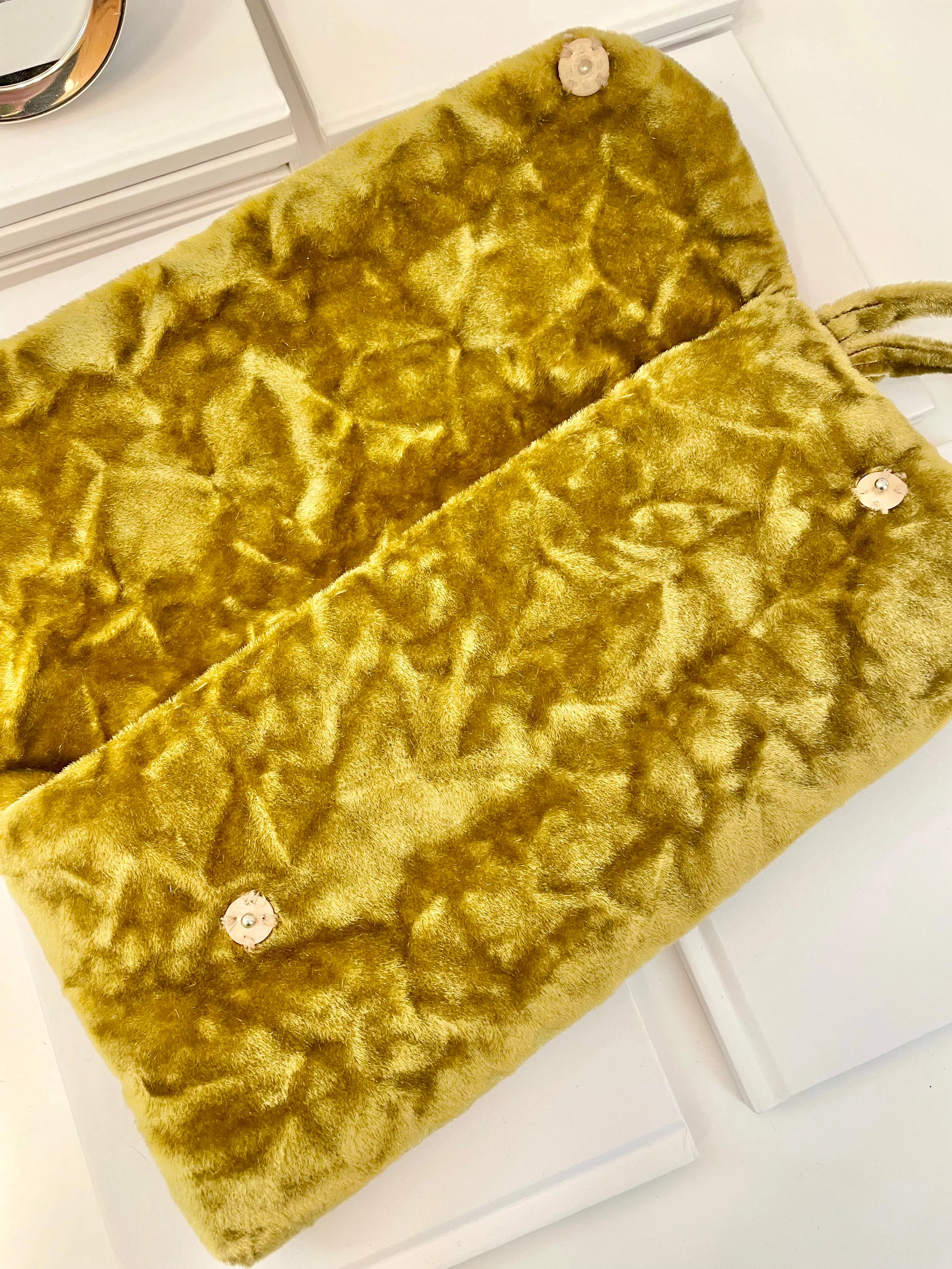 The Cheeky Mistress and her love of colorful velvet evening bags! So chic.