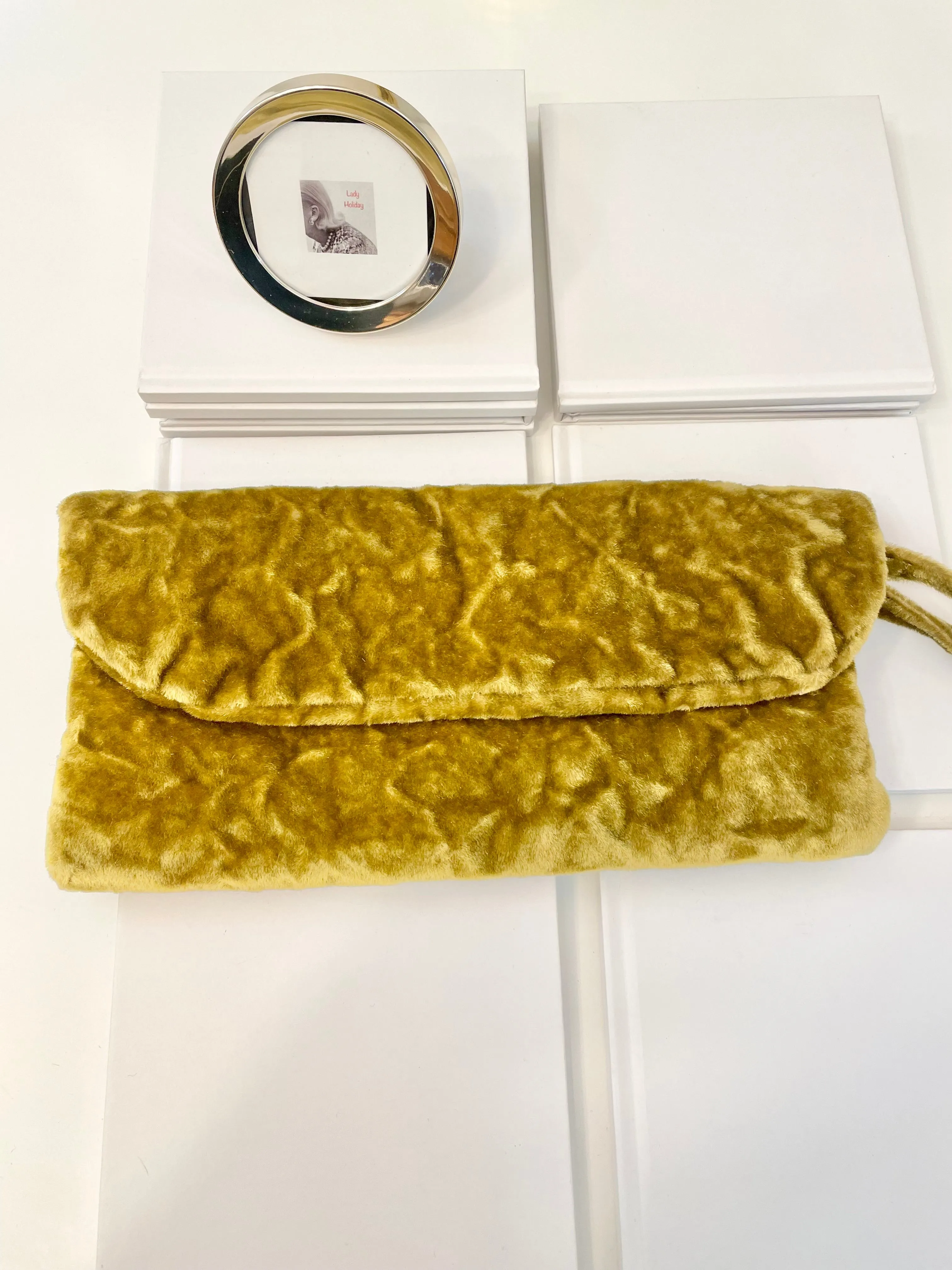 The Cheeky Mistress and her love of colorful velvet evening bags! So chic.
