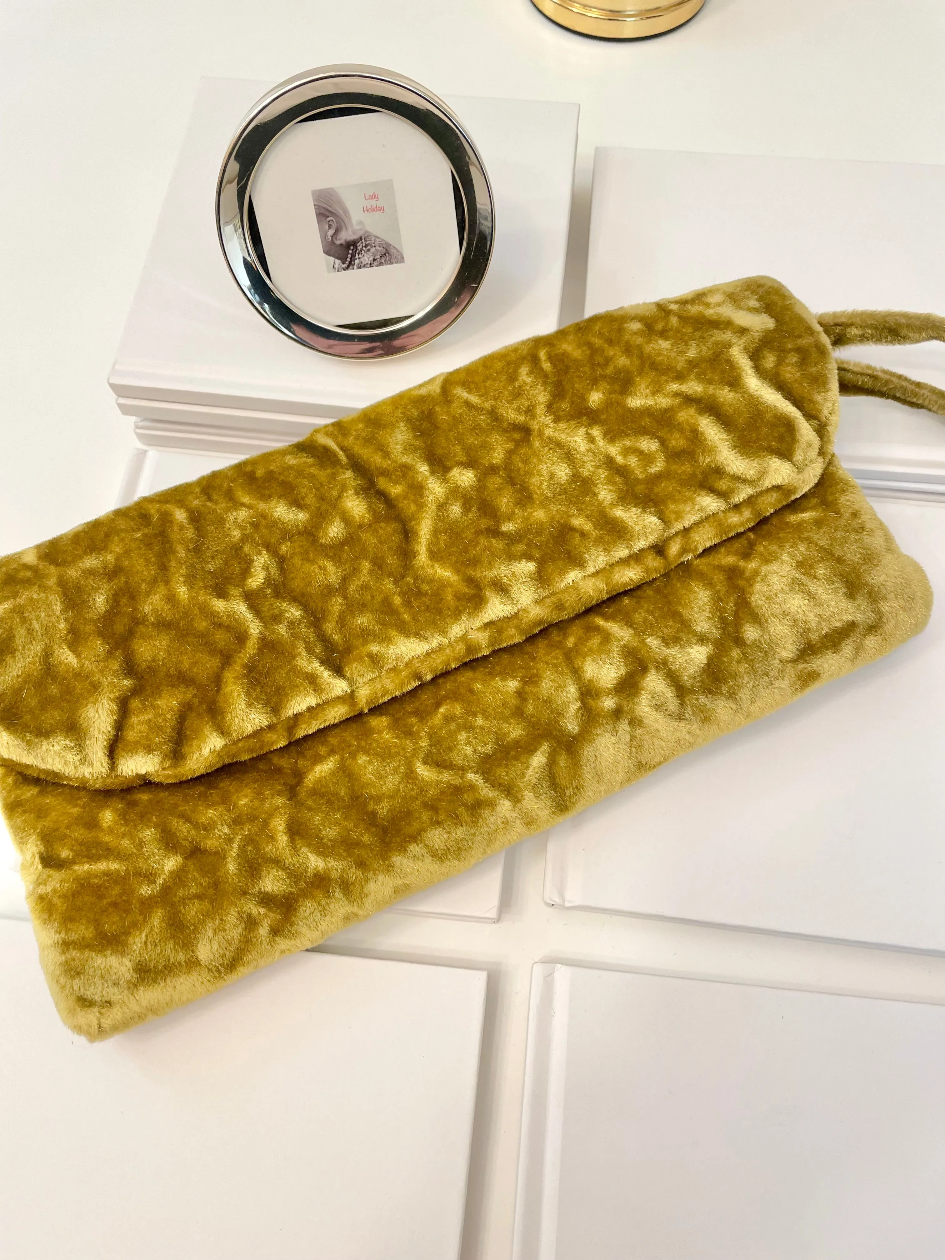 The Cheeky Mistress and her love of colorful velvet evening bags! So chic.